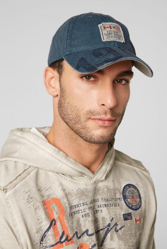 Base Cap mit Used Look und Artwork