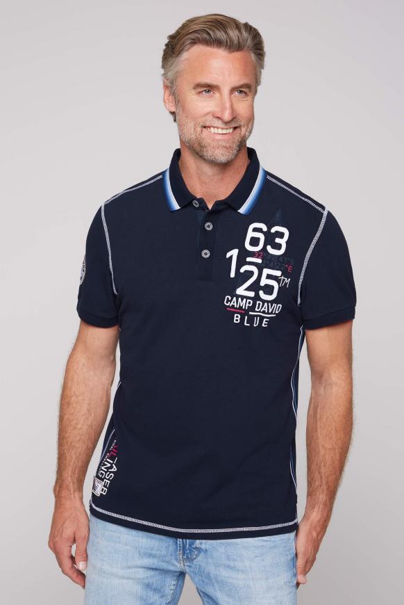 Pikee-Polo mit Artwork-Stickereien