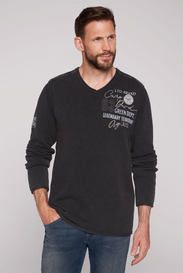 Pullover mit Strickmuster und Artworks