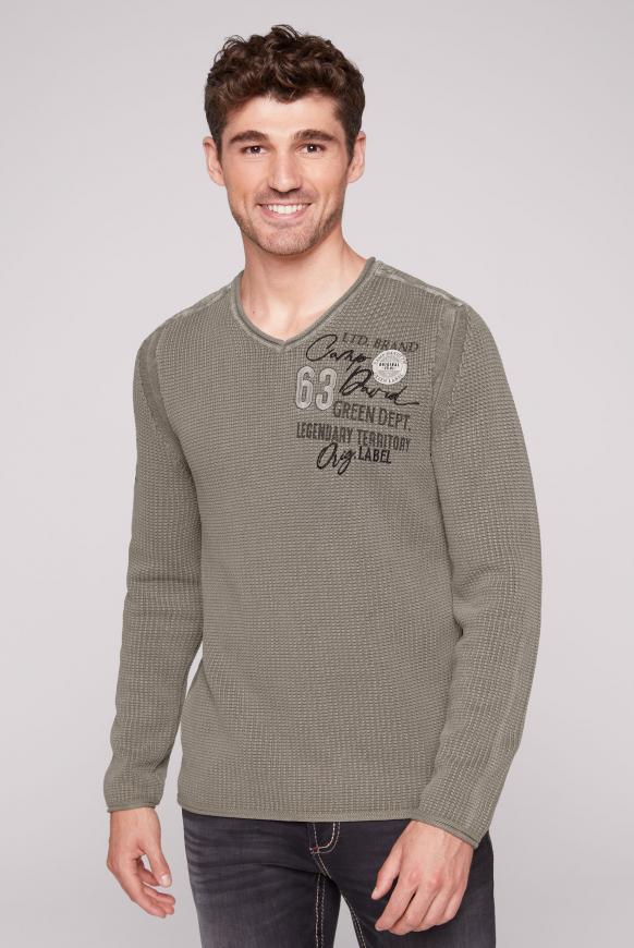 Pullover mit Strickmuster und Artworks