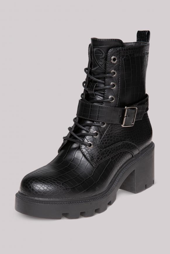 Schnürboots mit Riemen und Absatz