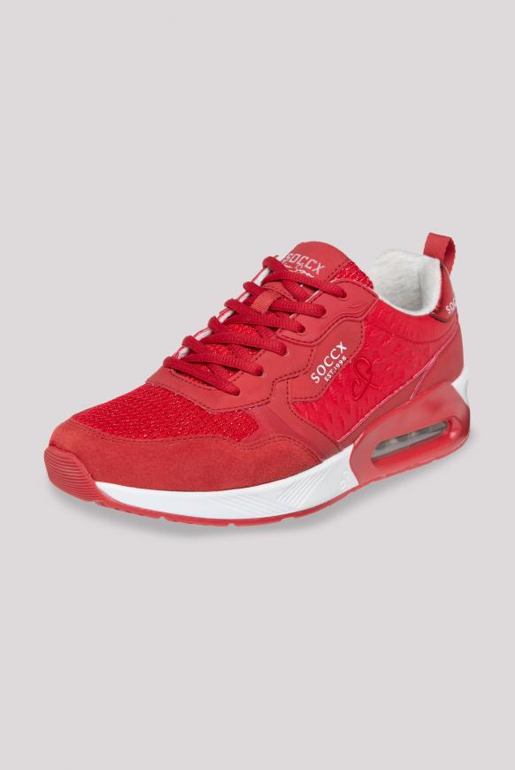Sneaker im tonigen Materialmix clear red