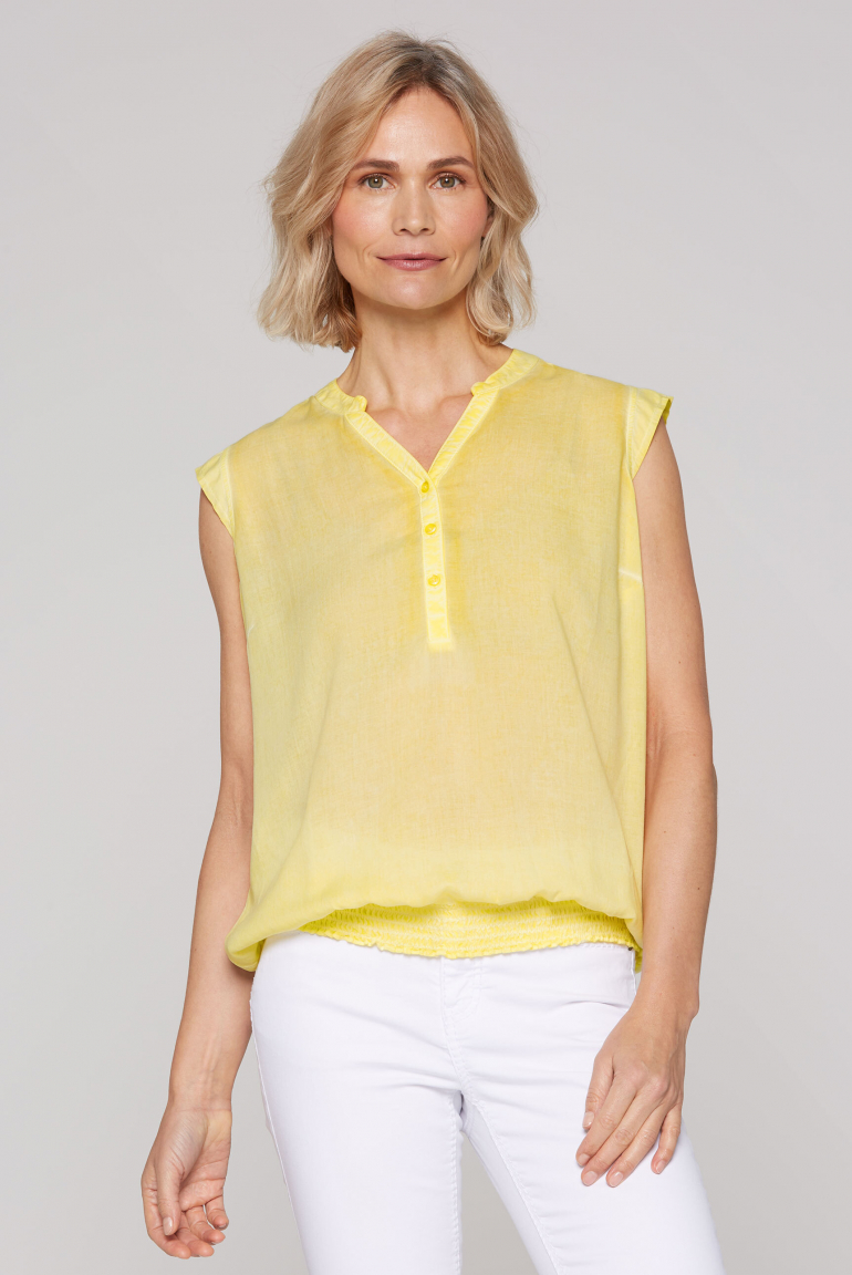 Ärmellose Bluse mit gesmoktem Saum und Rückenprint soft yellow