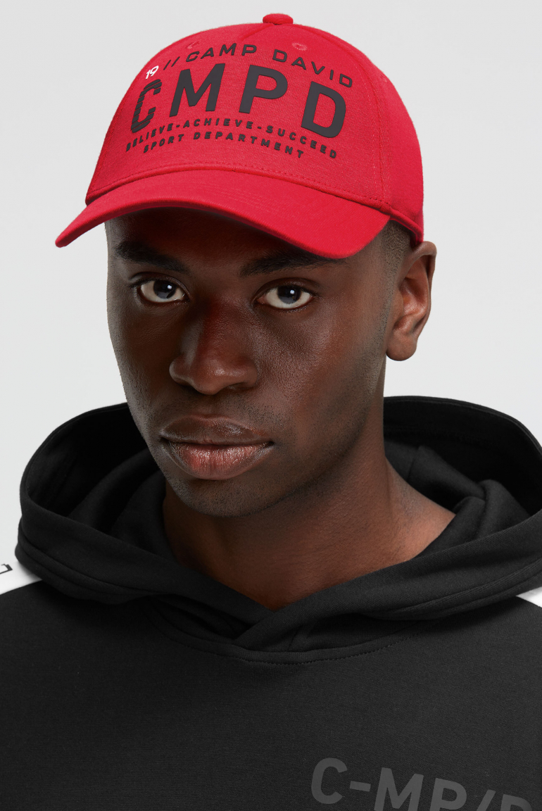 Base Cap aus Interlock mit Logo Design bright red
