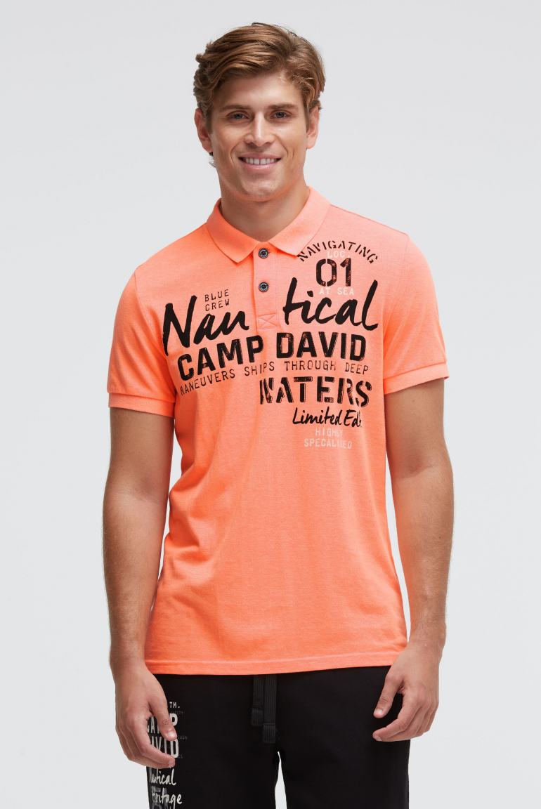 Kurzarmpolo aus Pikee mit Artwork speed orange neon