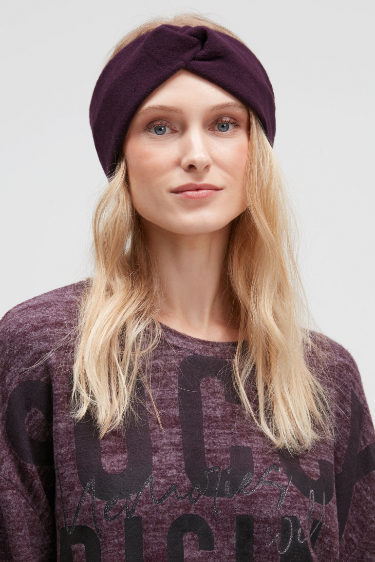 Stirnband aus Flauschstrick night plum