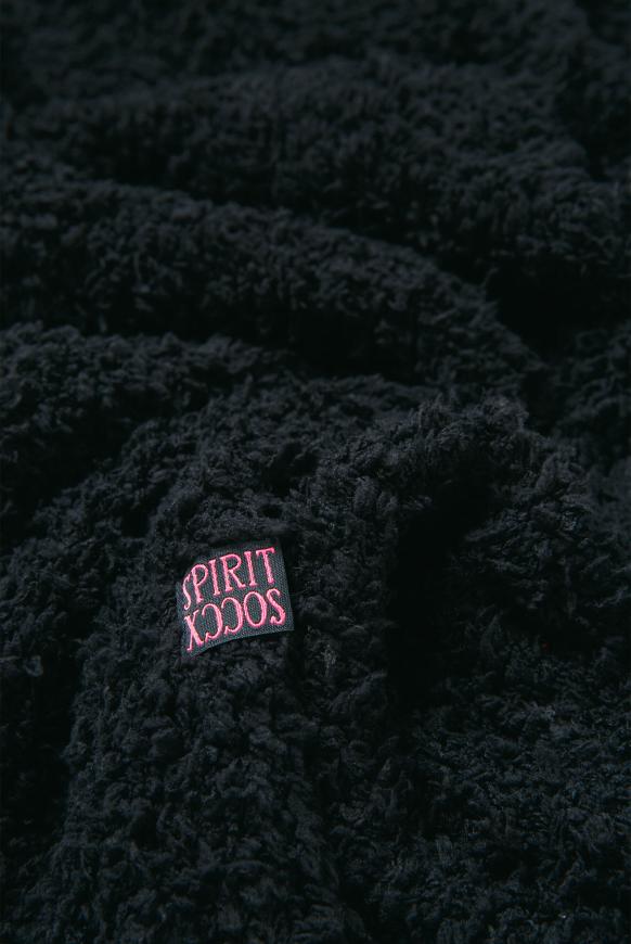 Strickschal in Sherpa-Optik