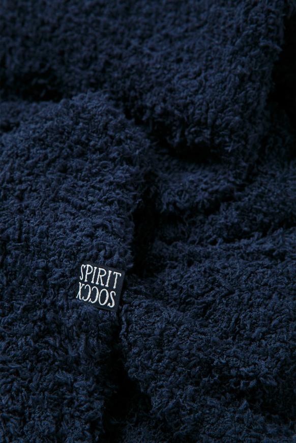 Strickschal in Sherpa-Optik