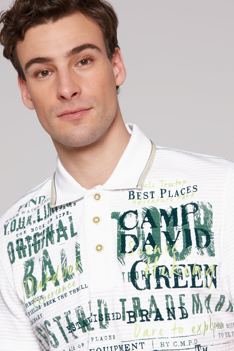 Gestreiftes Polo mit Prints und Stickereien
