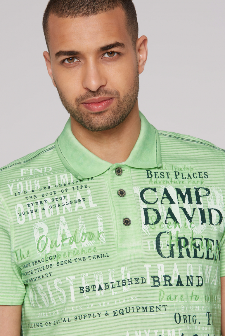 Gestreiftes Polo mit Prints und Stickereien
