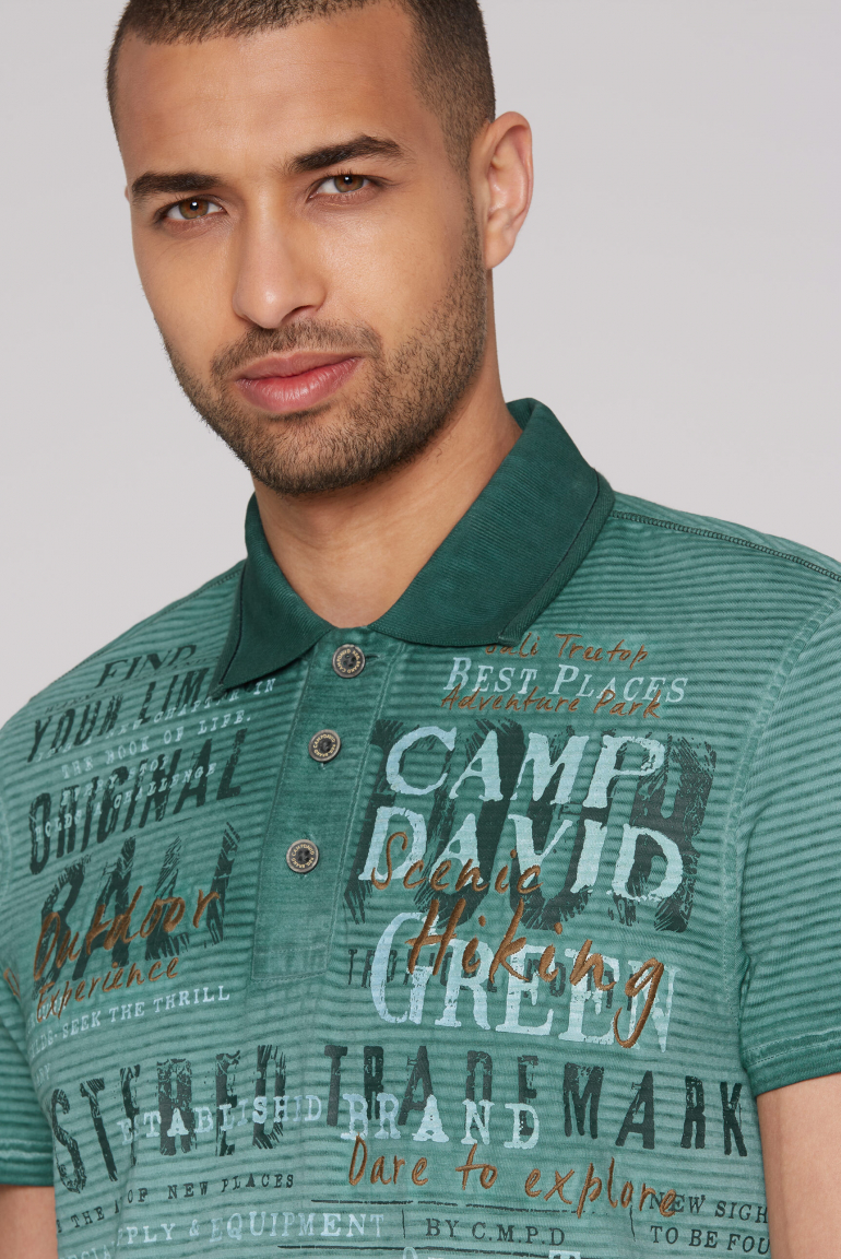 Gestreiftes Polo mit Prints und Stickereien