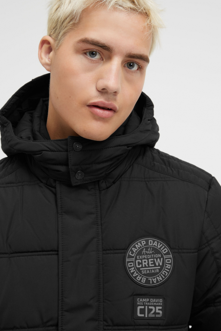 Lange Steppjacke mit Kapuze und Rücken-Artwork