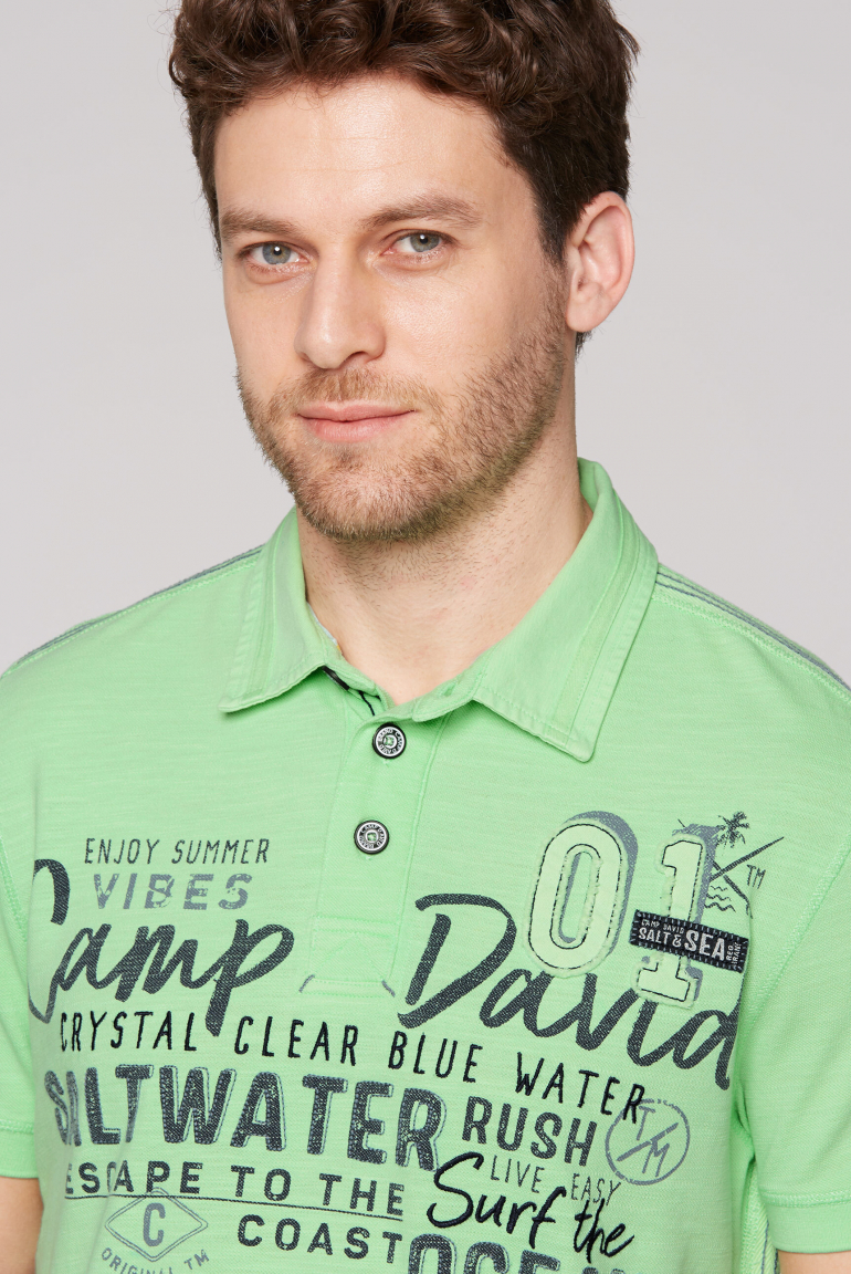 Polo aus Flammgarn-Pikee mit Label-Applikationen