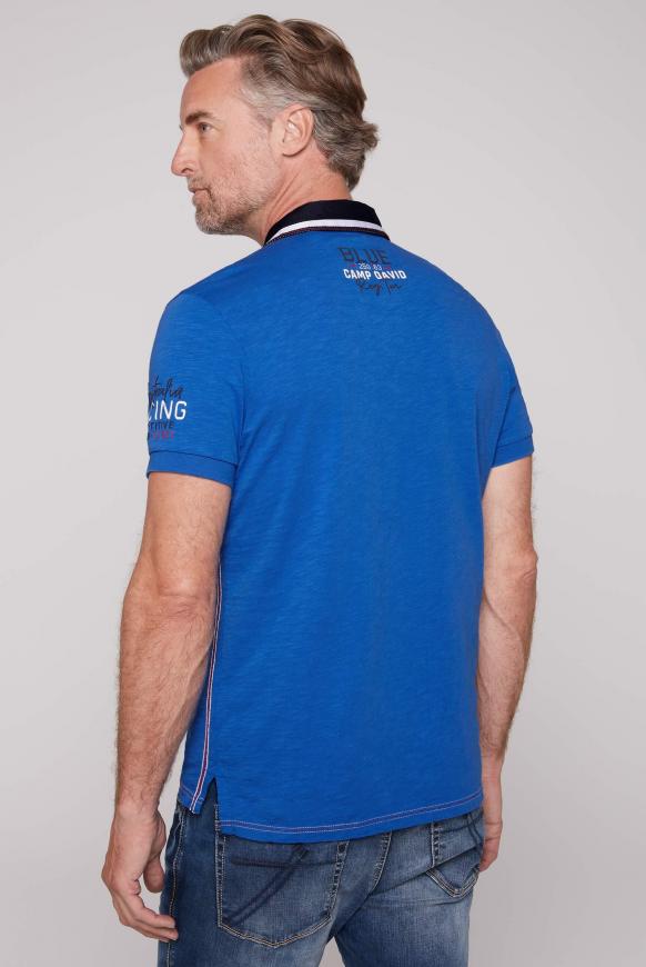 Poloshirt mit Artworks und Kontrastkragen