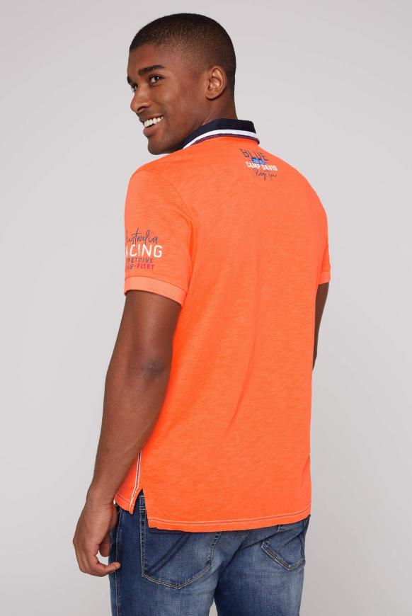 Poloshirt mit Artworks und Kontrastkragen