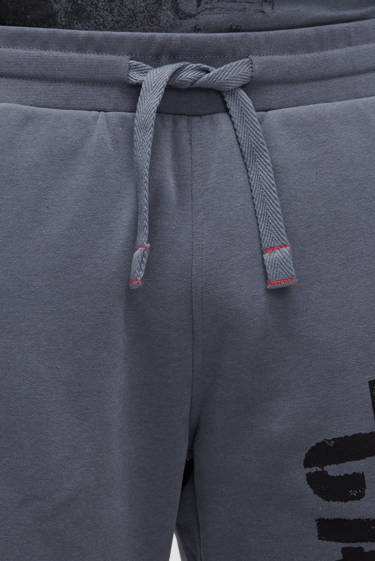 Jogginghose mit Seitentapes und Logo Prints
