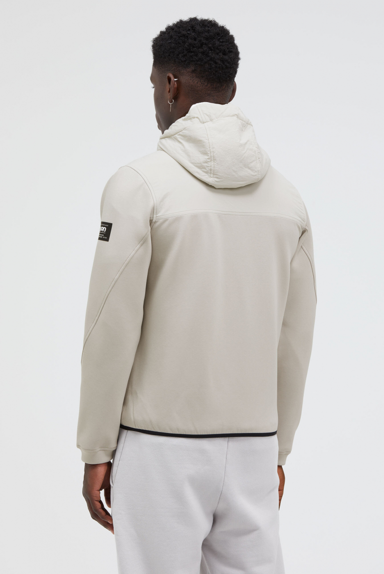 Kapuzenjacke im tonalen Materialmix