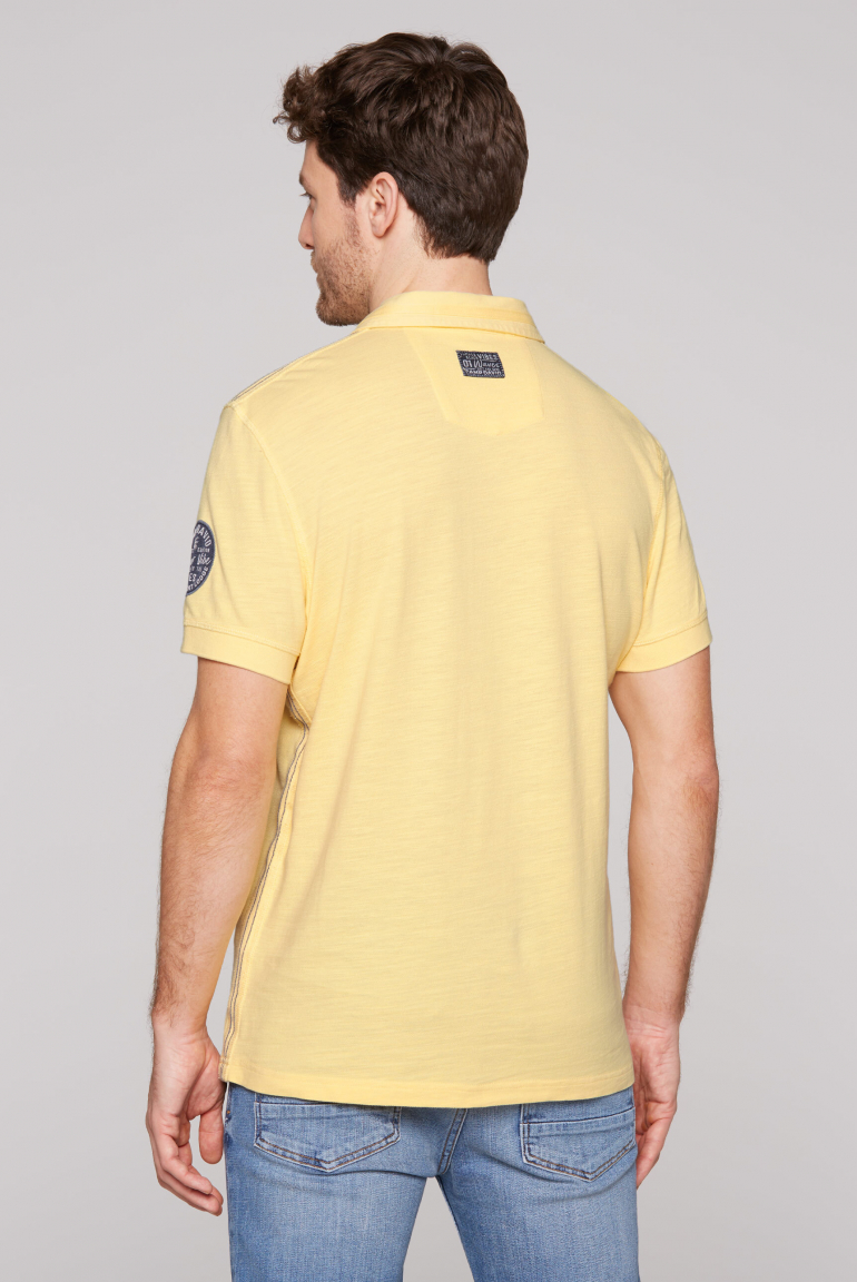 Polo aus Flammgarn-Pikee mit Label-Applikationen