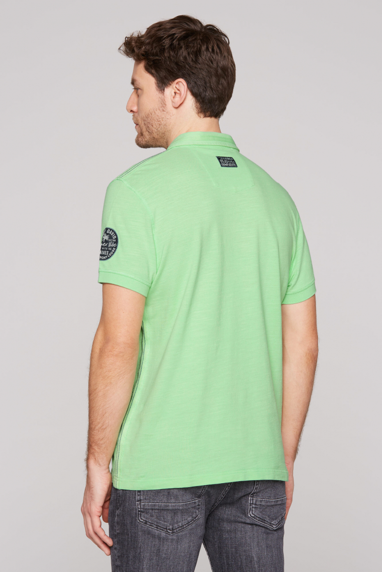 Polo aus Flammgarn-Pikee mit Label-Applikationen