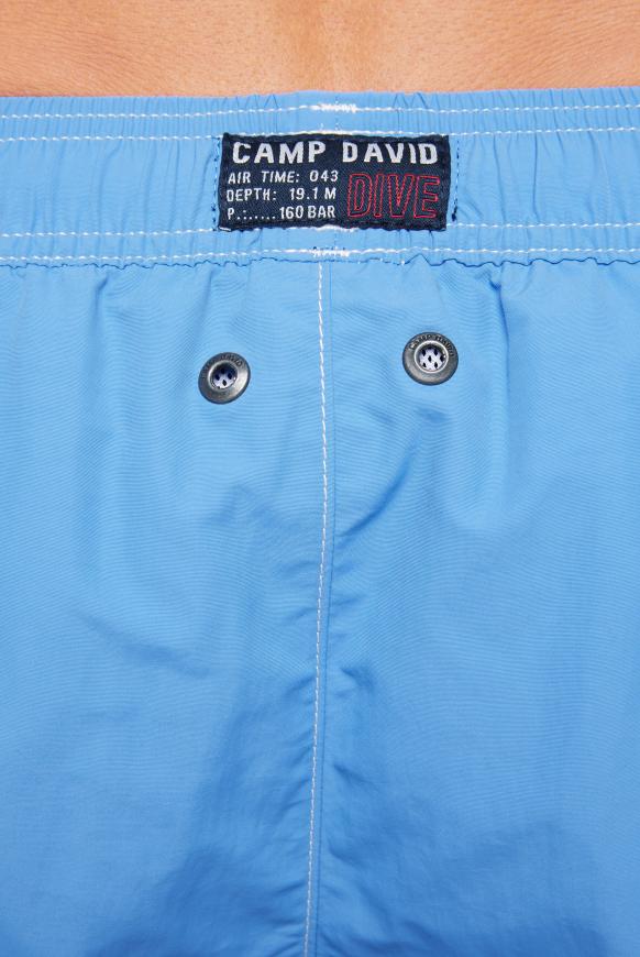 Badeshorts mit Logo Print