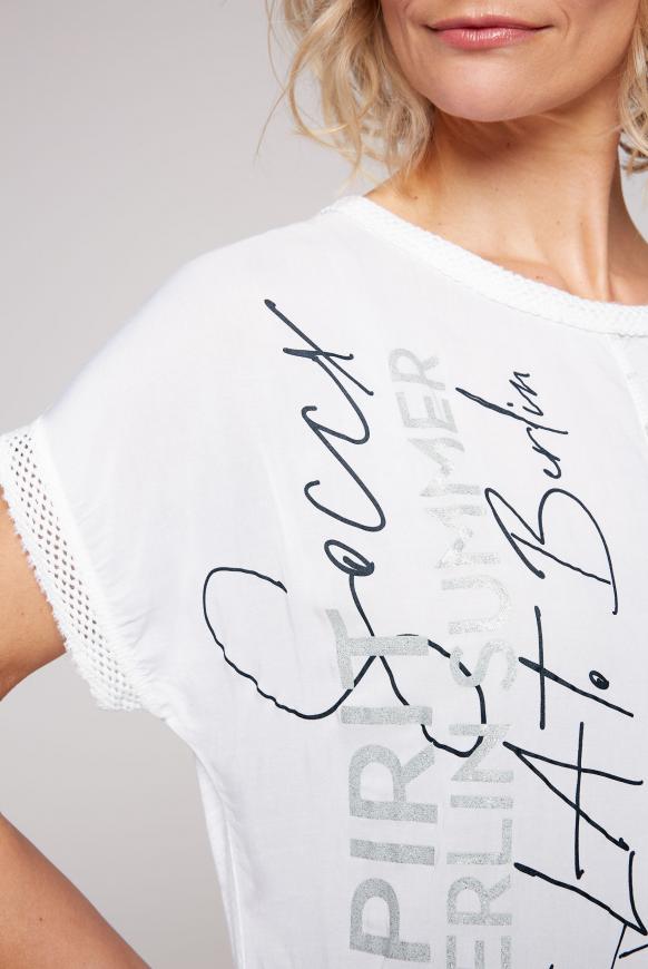 Blusenshirt im Muster- und Materialmix