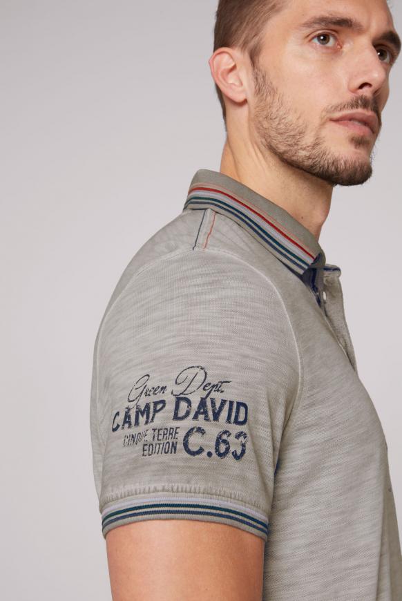Poloshirt aus Pikee mit vielen Artworks