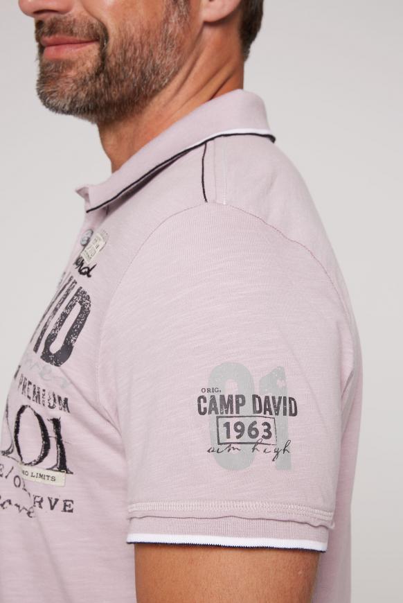 Poloshirt mit Label-Applikationen