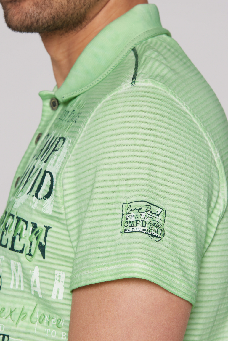 Gestreiftes Polo mit Prints und Stickereien