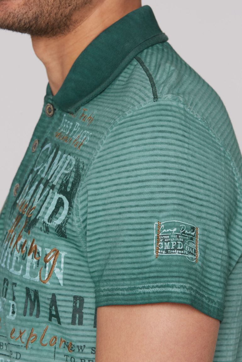 Gestreiftes Polo mit Prints und Stickereien