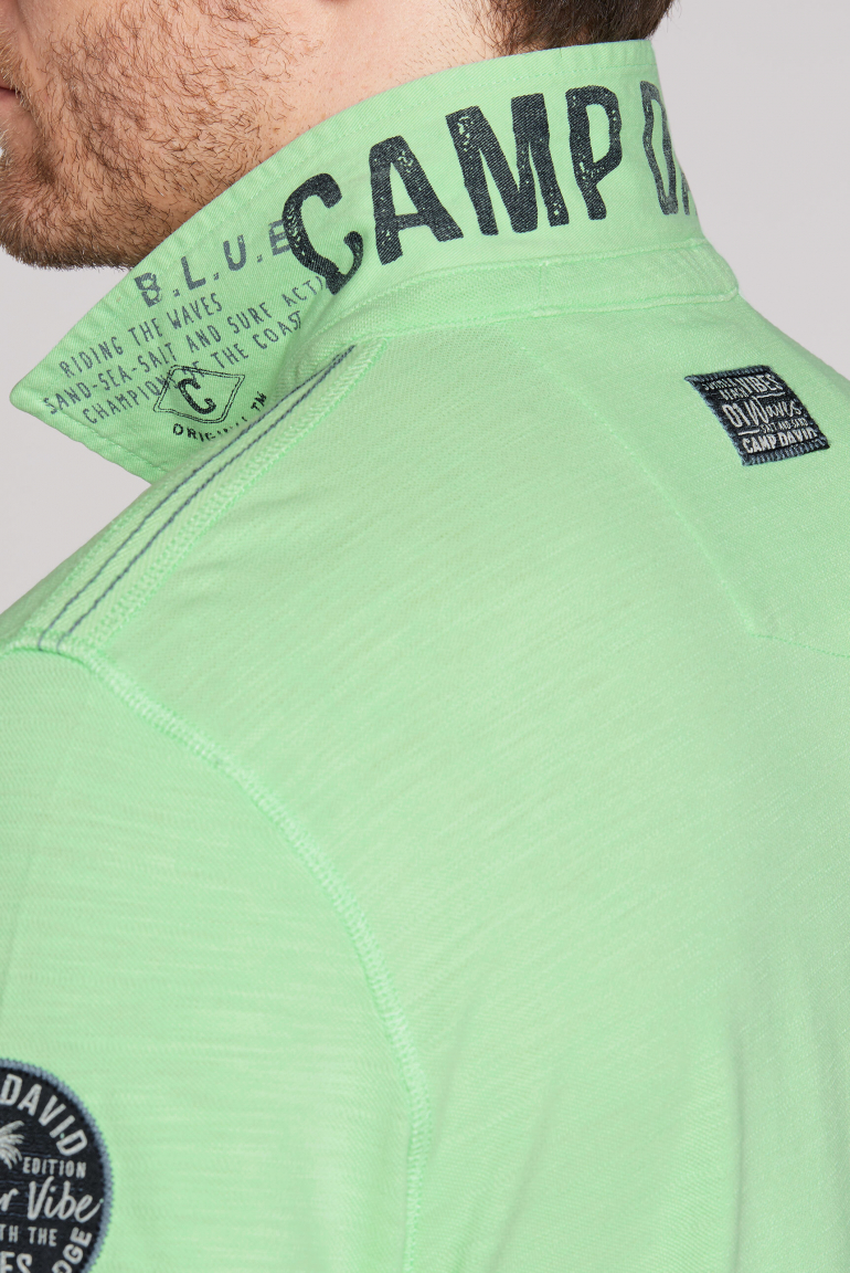 Polo aus Flammgarn-Pikee mit Label-Applikationen