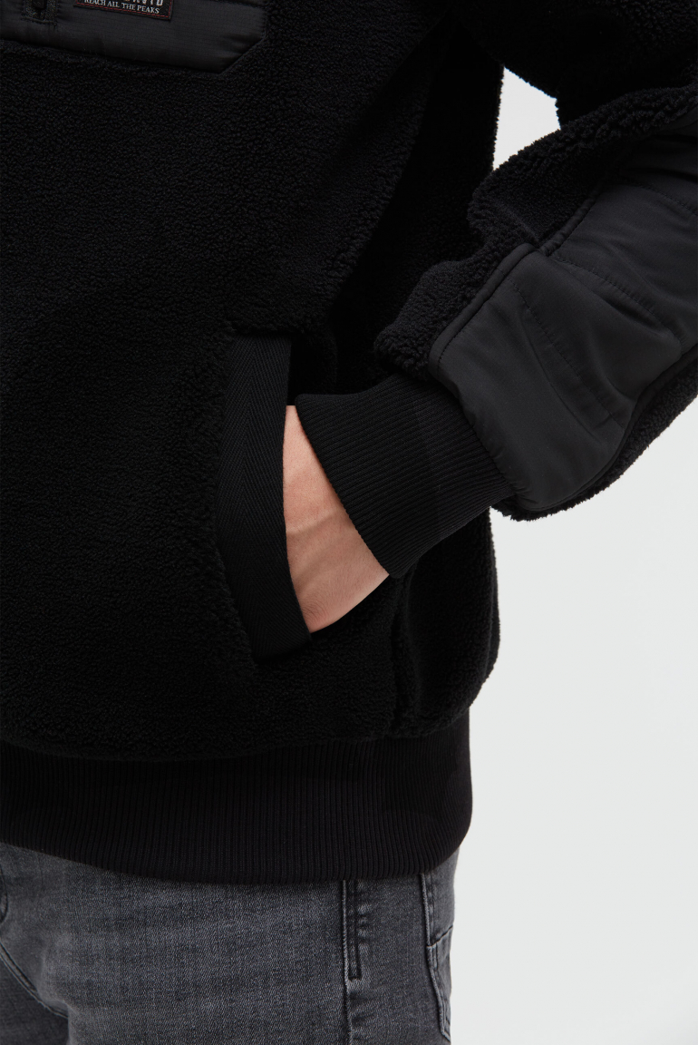 Teddyfleecejacke im tonigen Materialmix
