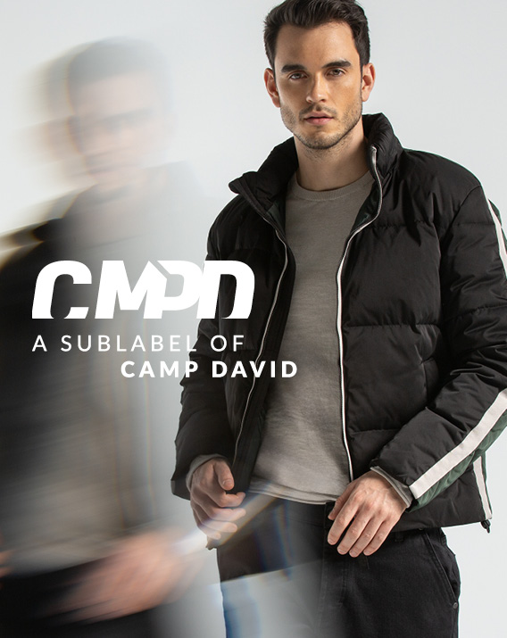 Model trägt schwarze Pufferjacke